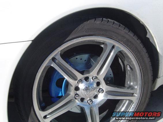 blue-caliper.jpg Photo of Blue Calipers on Crossdrilled and sloted 99 SH Rotors.