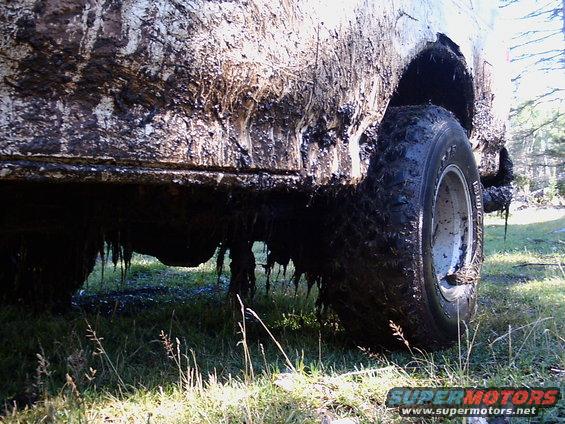 wheelin-on-capulin-mountain-(2).jpg Looked like it came from the swamp after I finally removed it.  Notice the usual rust on the fenders.