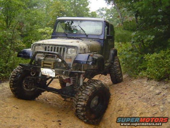 n6209482_30130991_1161.jpg And yes, that's me chillin under it.  Never thought my Jeep would make 37's look small