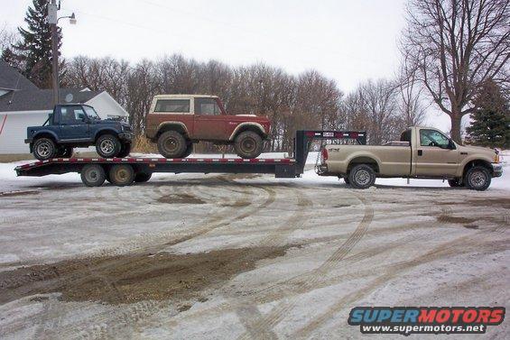 100_2045.jpg Here is a pic of my 2001 F350 hooked to my 30' Blair trailer hauling my 75 Bronco and 88 Samurai.