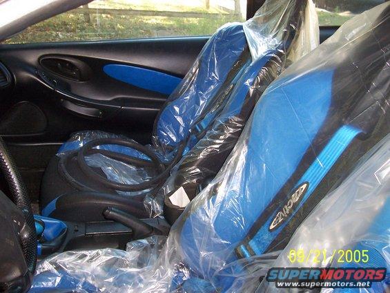 race-int.jpg my interior covered in plastic for storage. itll all be deifferent again this summer