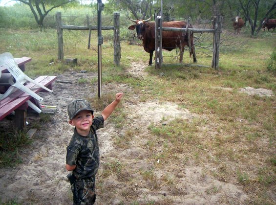 jr-chasing-bull1.jpg Jr. decides he is gonna show the bull who is boss!