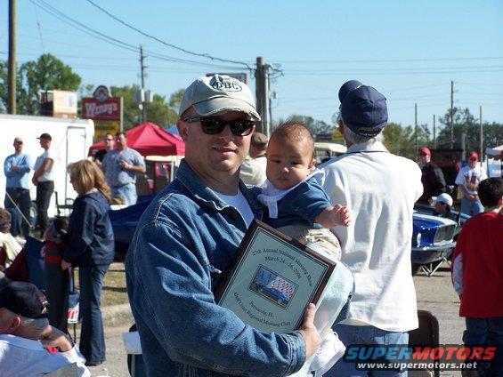 000_0183.jpg Me and son with our newly won (and well-earned) First Place plaque for the 27th  Mustang/All-Ford Nationals