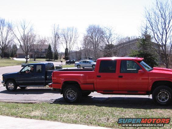 img_0614.jpg My '95 GMC ext cab stepside & my neighbors '97 GMC crew cab stepside!!!!! Also have a neighbor with reg cab stepside too.