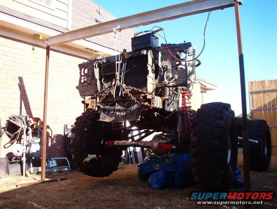 06winch.jpg It lifted it, but barely.  There's no way this is 4,000 lbs (I'm using the snatch block), so the winch is obviously overrated.  But the body is only ~400 lbs, so I think it'll do OK for that.

My '83's '93 body: [url=http://www.supermotors.net/registry/media/921217][img]http://www.supermotors.net/getfile/921217/thumbnail/99up.jpg[/img][/url]

My '93EB's body: [url=http://www.supermotors.net/registry/media/1039302][img]http://www.supermotors.net/getfile/1039302/thumbnail/02bodylift01.jpg[/img][/url]