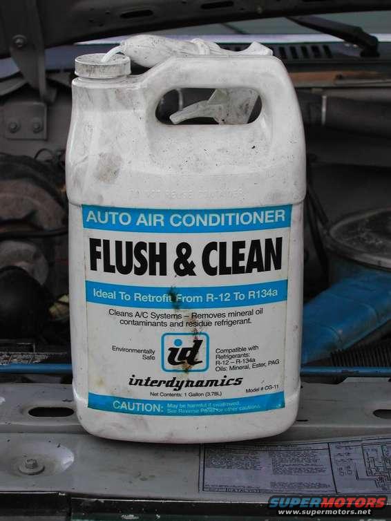 flush__clean.jpg Flush & Clean

In my case the compressor had been off since I bought the Bronco so I didn't have any old R12 to get rid of. From what I'm told the number one problem with this conversion is that R12 and R134a don't like each other. The oils used don't like each other and the residue left behind by the R12 will sabotage your work. The first step then is to get the whole system completely cleaned of all R12 gas, oil, and residue. Of course, it's against the law to vent R12 into the atmosphere. The local A/C shop will, for a small charge, hook up to your system with their recovery equipment and gladly suck you dry (their speciality). After getting rid of the R12, completely disassemble the system. Remove the hoses, old accumulator/dryer, evaporator and condensor coils and the compressor. You will find quite a bit of oil in the system. Most of it ends up in the compressor and the evaporator. Drain these first. Get some A/C system flush & clean (+/- $30.00 for a gal.) and use about half a gallon to completely flush out all the components. I used shop air to blow everything out but make sure you've got a good dryer because any moisture in the system will screw things up. I spent a good 2 or 3 hours on the cleaning phase. 
