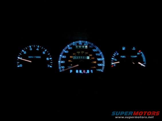 tach_night.jpg This is my new Cluster with Police Package Speedometer and 7K Tach during the night.