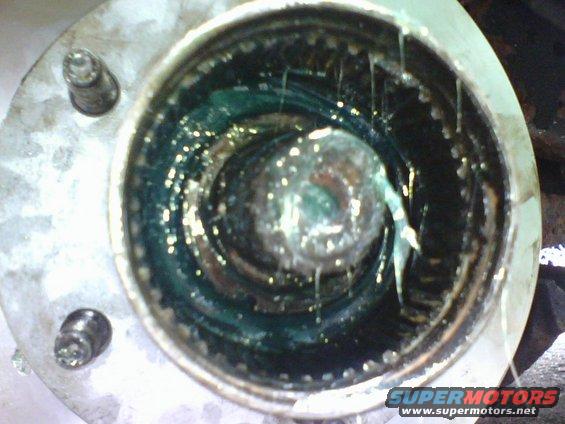 q3.jpg with the rear bearing seal pressed in I had slippped the bearings on the spindle and hand pressed the outer bearing with a tube matching the ID of the inner race.   the void inbetween the two bearings was filled with marine bearing grease as was suggested in the forum. 