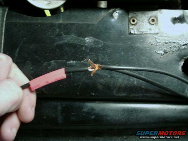 soldering-splice--4.jpg Don't forget to have the heatshrink ready and insert the wire through the hole.