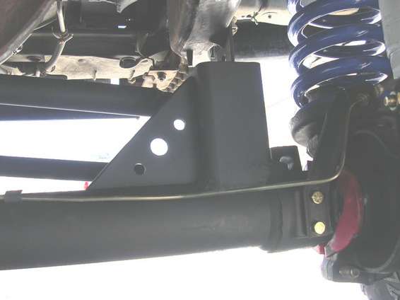 lowertrac2.jpg rear of lower track bar mount. the holes add at least 15 horse power