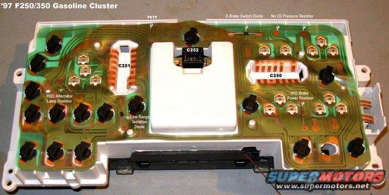 cluster97hd.jpg 97 HD Cluster
IF THE IMAGE IS TOO SMALL, click it.

Note the lack of a resistor for the oil pressure gauge.  Modifying this cluster to show true oil pressure is different because the resistor is integrated into the gauge head.  The gauge head would have to be swapped for an older one & then the sender installed in place of the pressure switch.

But it can still have a low fuel light.

[url=http://www.supermotors.net/registry/media/760981][img]http://www.supermotors.net/getfile/760981/thumbnail/clusterbezel9296.jpg[/img][/url]