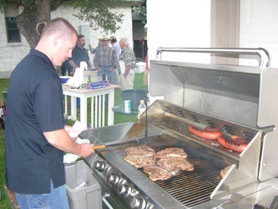 cooking-at-tinks-party.jpg Coach BBQ'n at Tink's B-day Party. Armadillo Steaks anyone?