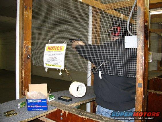 me-firing-my-springfield-xd9-same-night-i-bought-itthe-range-was-freezing-about-45-degrees.jpg Me firing my Springfield XD-9 same night I bought it-the range was freezing about 45 degrees