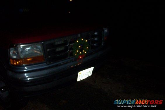 dcp_0575.jpg Lighted wreath on the grill for the holiday season