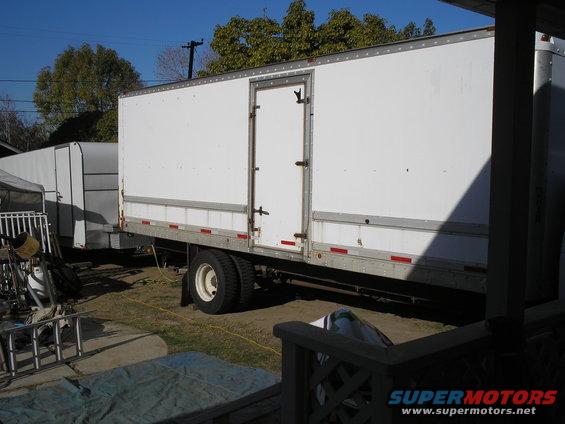 12207-009.jpg poor shot showing it hooked up the the 24' box trailer. had lots to move  to get both to fit in the back yard.