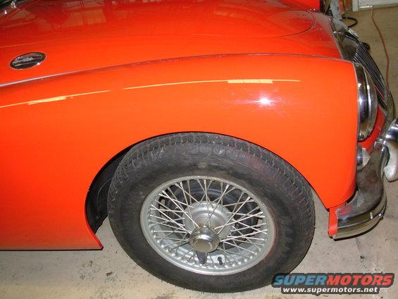 12rhfwheel.jpg The flash is washing out some of the color.  The car is actually very red.