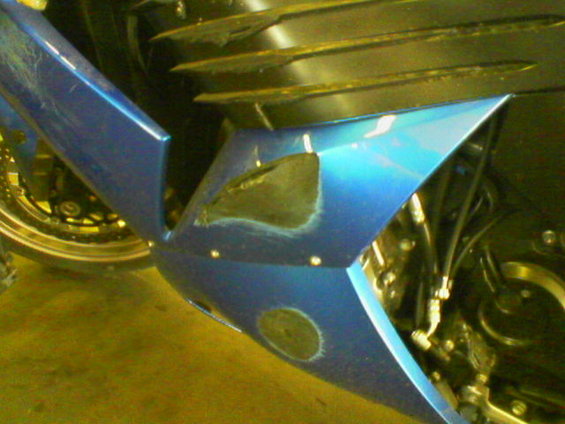 picture058.jpg The bike's road rash almost matches mine.