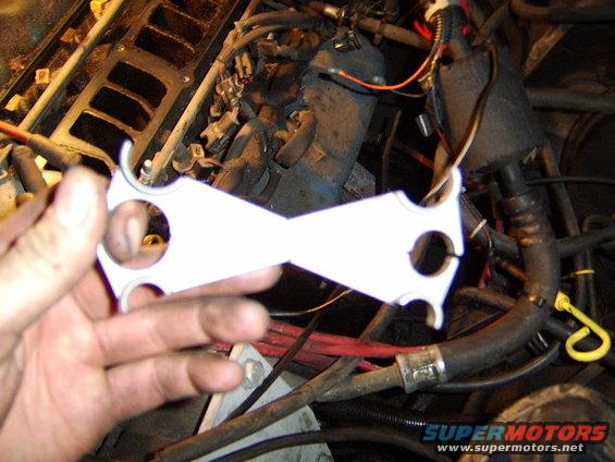 change-oil-pan-gasket-and-valve-cover-gasket-037.jpg to make removal of the wires going to the injectors and all the sensors and such easier, I needed to disconnect the fuel lines using this tool to unlock the connection