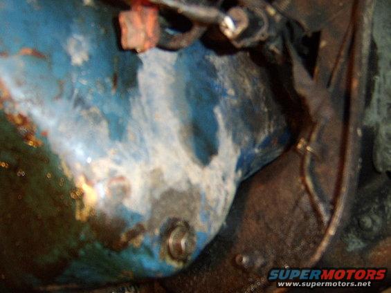 change-oil-pan-gasket-and-valve-cover-gasket-061.jpg here the oil pan is unbolted and sitting on the crossmember