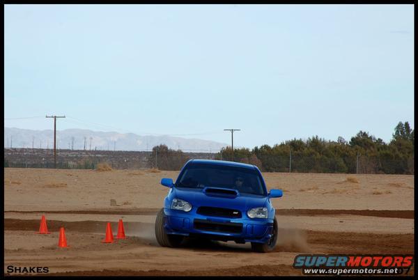 l_0d0dfd40d914d7acbe2cfdcebbfb27cb.jpg hard at work on the rallycross course