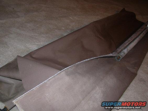 07slideoff.jpg The plastic might be adhered to the drum, so it may be necessary to flex it to break it loose.