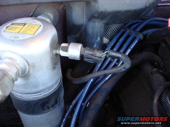 ac-connector-old.jpg the AC stopped blowing cold air. i did not see the compressor cycle on and off. i pulled the low pressure switch and ran a jumper and the compressor started to run. i looked at each fitting for leaks. i did not find any so off to the AC shop and get a recharge. The PO did a swap to R-134A and the new valve leaked so he put some silicon in the fitting and screwed the cap back on. well it leaked. we found the low pressure switch connector was bad. we could wiggle the connector and get the compressor to run. Time to replace.