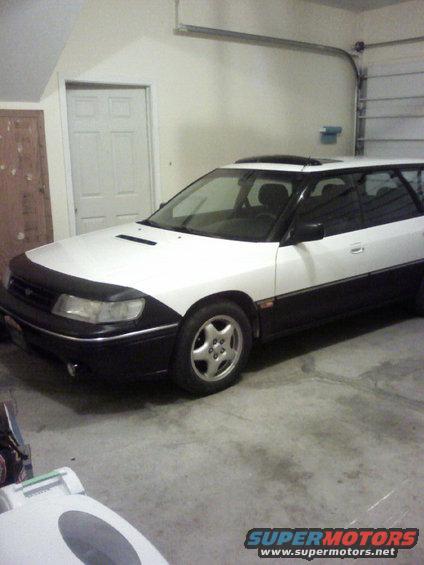 subiegarageside.jpg My Subie Just after I finished the rest of the protective coating on the lower half. 24 hours and I'll  be able to drive it again.. lol