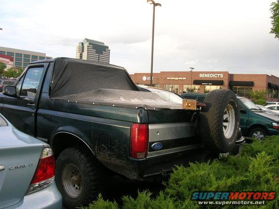 dscn2725.jpg My cover up to protect from rain while parked. Need a window so I can drive like this