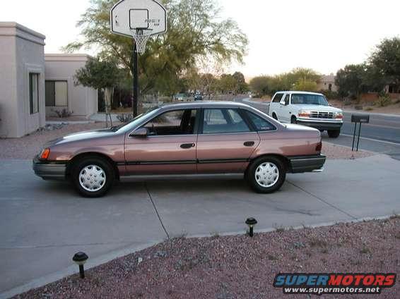 taurus1.jpg Right before going to the paint shop. The clearcoat was peeling heavily.