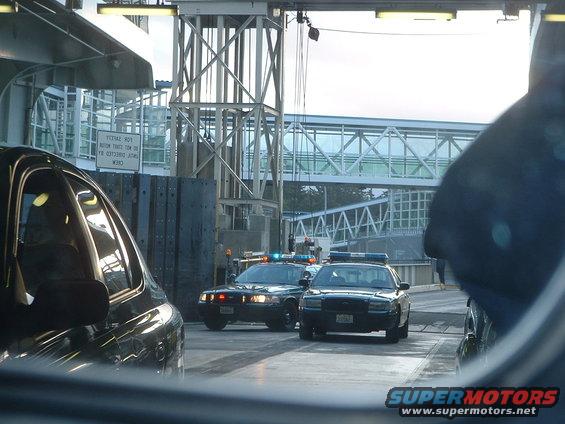 dscf0021.jpg Kitsap County Sheriff deputies on ferryboat in Kingston (rearview mirror)