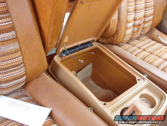 ballpinconsole.jpg Center Console with '78-80 ball-pin snaps instead of the more common '81-91 glove-box-style catch.

[url=https://www.supermotors.net/registry/media/898400][img]https://www.supermotors.net/getfile/898400/thumbnail/consolefloor8091.jpg[/img][/url]