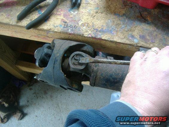 clips.jpg Ah, the Jesus clips.  Great invention, except when they rust.  Grab needle nose pliers and squeeze the two ends together, then pull up.  This is plan B - rust is too strong.  Beat them into submission...