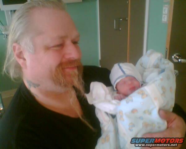 g-m-k.jpg Me and my grandson 1 hour old (him)he he 4,3 pounds but now much bigger.