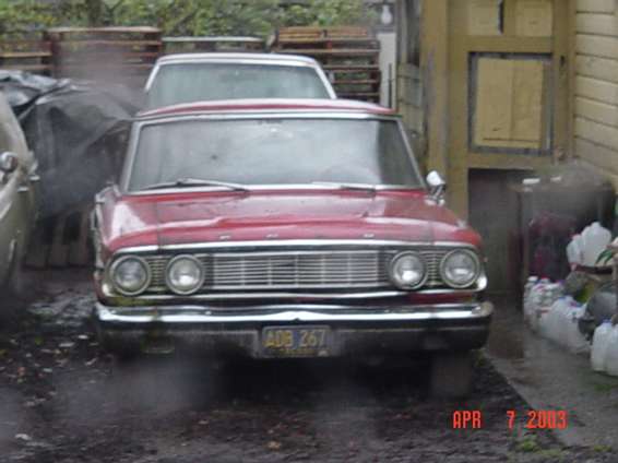 red_fairlane_001.jpg Found this one, real mossy, 289, auto, black interior, also has reverse lights