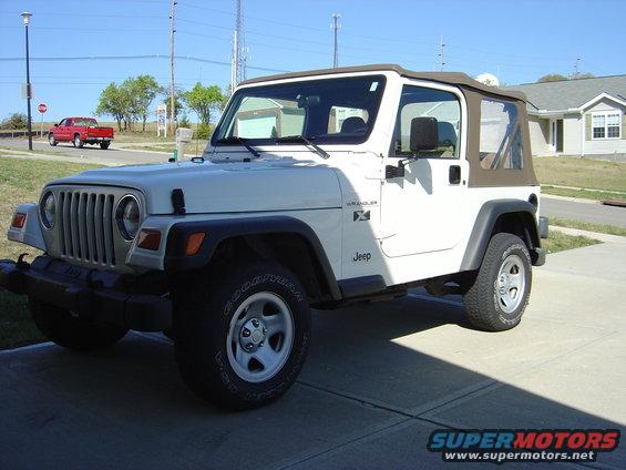 2007092901.jpg Wrangler with stock suspension and wheels