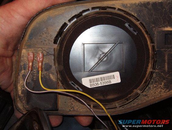 15signalwires.jpg The signal wires must be connected properly since the LEDs require correct polarity to function.  Test the signal & motors before installing the mirror onto the tilt ring since it's VERY difficult to remove intact.

Signal mirrors display a supplemental turn signal through the outside rearview mirror glass surface. The signal is directed toward vehicles in adjacent traffic lanes and is not visible to the driver of the equipped vehicle.

The signal mirrors are equipped with an integrated light sensor and automatically adjust the brightness of the signal display for day and night operation. The signal is connected directly to the turn signal wiring.
