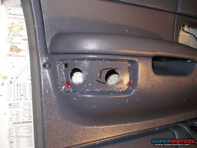 driver-door-drilled.jpg I used a 1" hole saw for the initial removal.  