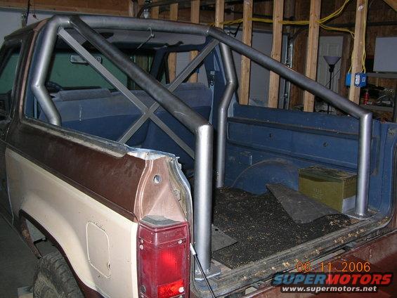 dscn0920.jpg I made the lift gate a fold down tail gate. The roll bar is designed to have a soft top stretched across it.