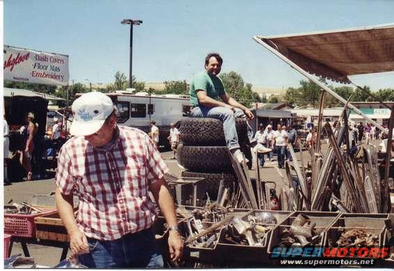 dsc00005.jpg Hot August Nights in Reno a few years ago! lots of Ford parts for sale! i am seen sitting on top of the original wheels from Big Ed my F250! good view from here.