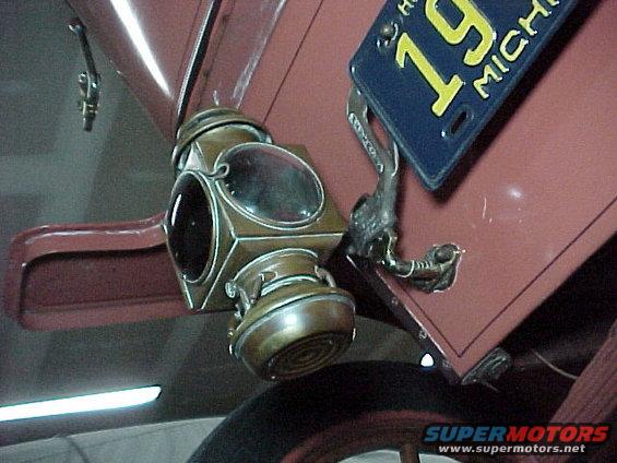 mvc045f.jpg Tail lamp bracket and "Neverout" license plate bracket