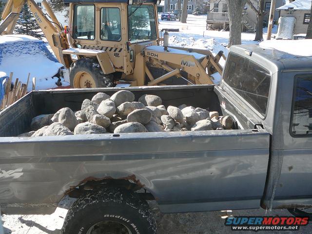 got-rocks.jpg Rocks removed by hand from original foundation.  6 full truck loads so far!