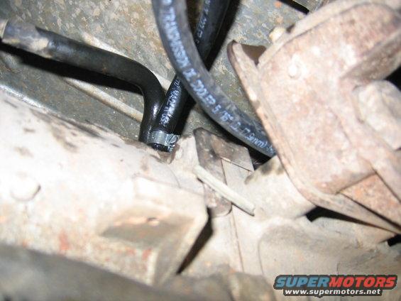 vent-lines-015.jpg transmission vent, located on top of the trans. there should already be a 3/8 hose connected to trans that connects to a metal tube. in the pic you can see the line in the forefront is the extended line from the transfer case, the 2nd line is the new one hooked to the tranny, the 3rd is the original i disconnected.