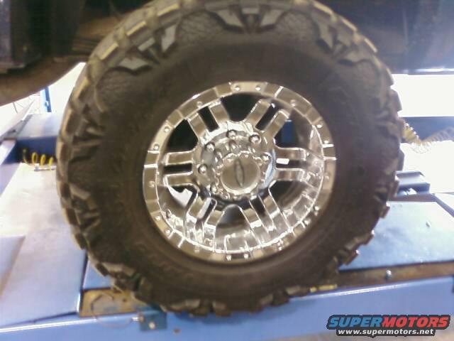 pic0065.jpg the old tires. bald 35\12.50 mud grapplers on the 17x9 moto metals