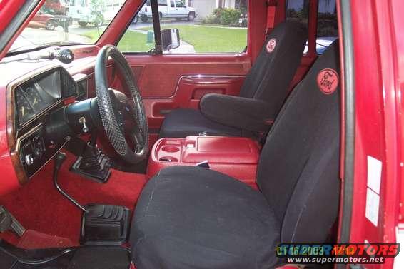 interior.jpg The interior is in PERFECT shape..  I was very lucky in getting the truck from someone that took great care of it.  I added the Ford seat covers because the seats were the only thing that showed a little wear.  Plus now they look damn good and breaks up that RED look of everything.