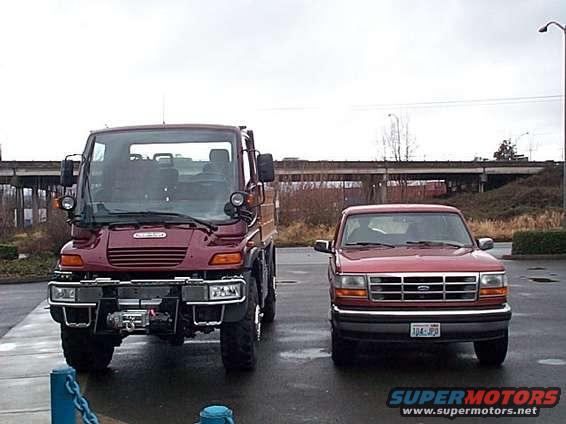 dcp00185.jpg My Dads 94 EB sitting next to a brand new Freightliner Unimog. 