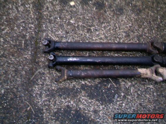 front-driveshafts-003.jpg Three front driveshafts The shortest is a shortened shaft for a D-35 conversion on a FM145 transmission application
the middle one is a stock length FM145 shaft, and perfect in length for a D-35 FM146 set up
The long one is a stock length FM146 shaft