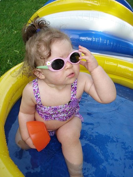 mia-at-12-months-074b.jpg Yeah, I like this.  Got my shades on...I got the hang of this now. 