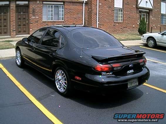 my_car_back_side.jpg I had this car for 3+ years: I tinted the windows 20% all around, 2 12 inch Memphis Studio subwoofers powered by a Memphis 500 Watt Class D sub amp, the 17 inch Epic Miami Wheels with 215/50/R17 Akurate HP tires, a cold air induction system (home made).  In the quarter mile she would run around 78 mph.