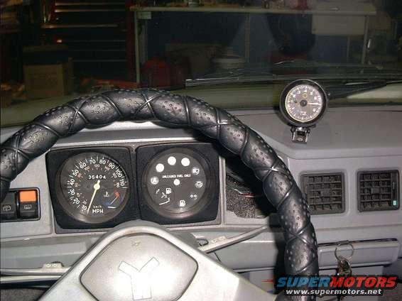 yugodashtach.jpg I've got the tach mounted so I can make clean, accurate shifts when racing Geo Metros down at the strip.