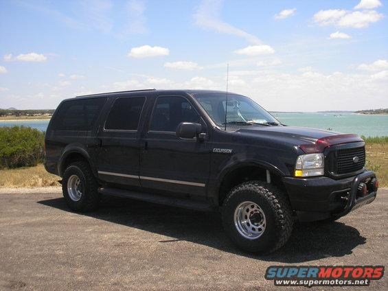 ex2.jpg added a 2.5 inch shackles in front, and 35X12.5 BFG mud tires, and 17X10 Weld side winders with more lift in the garage. 